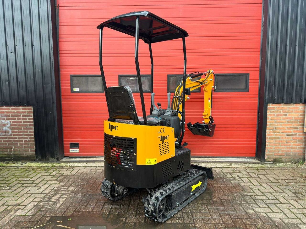 2024 JPC HT-12 mini excavator, rear three-quarter view