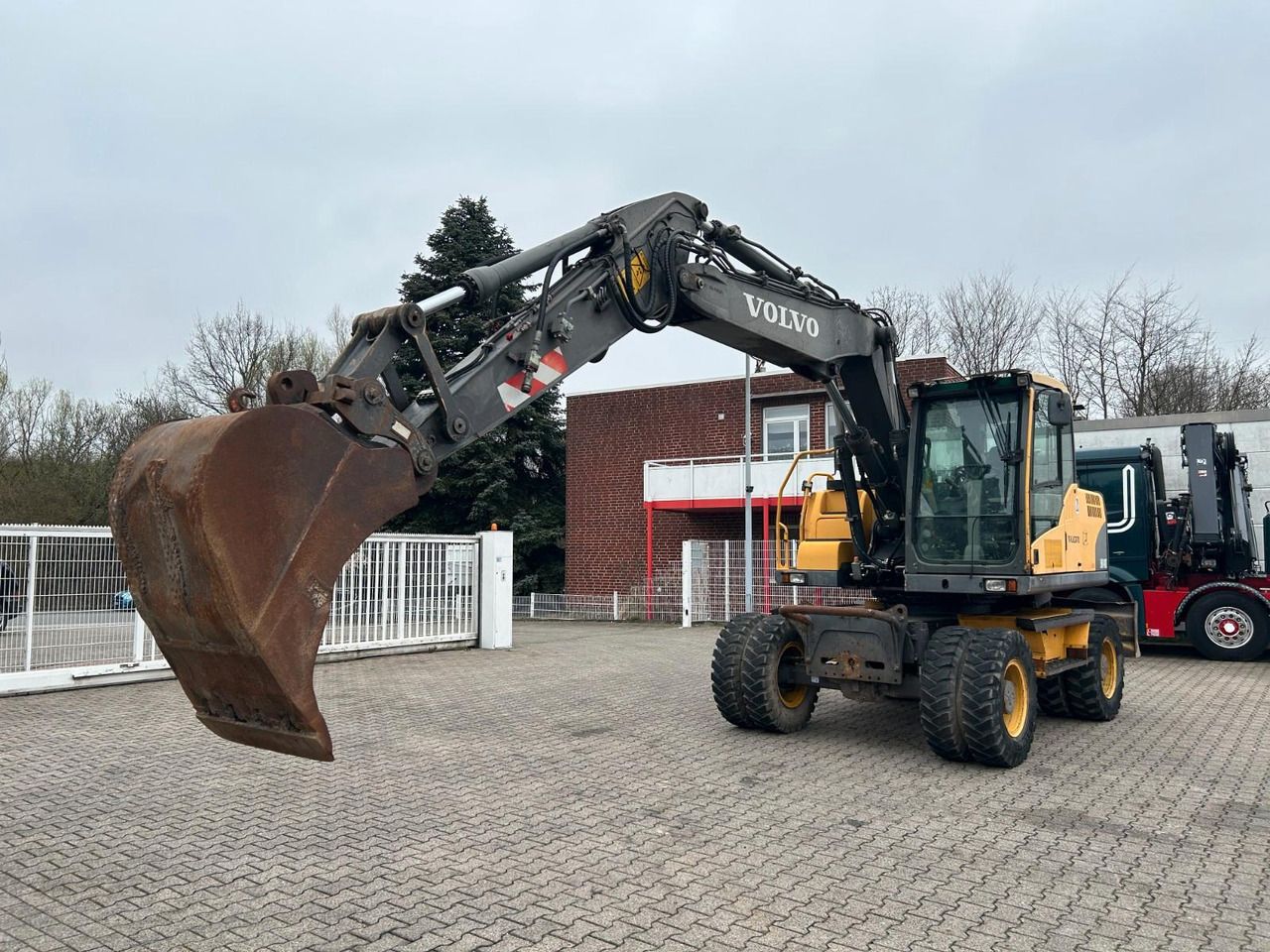 2008 Volvo EW140C wheel excavator, side profile view