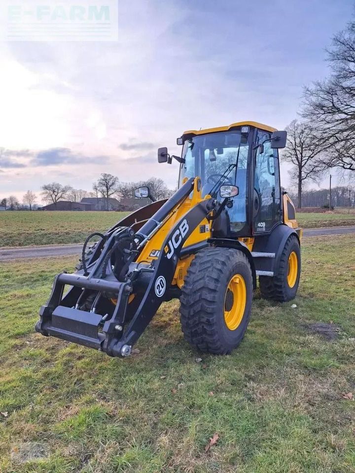 2024 JCB 409 AGRI mini excavator, front three-quarter view 2024 JCB 409 AGRI mini excavator, front three-quarter view