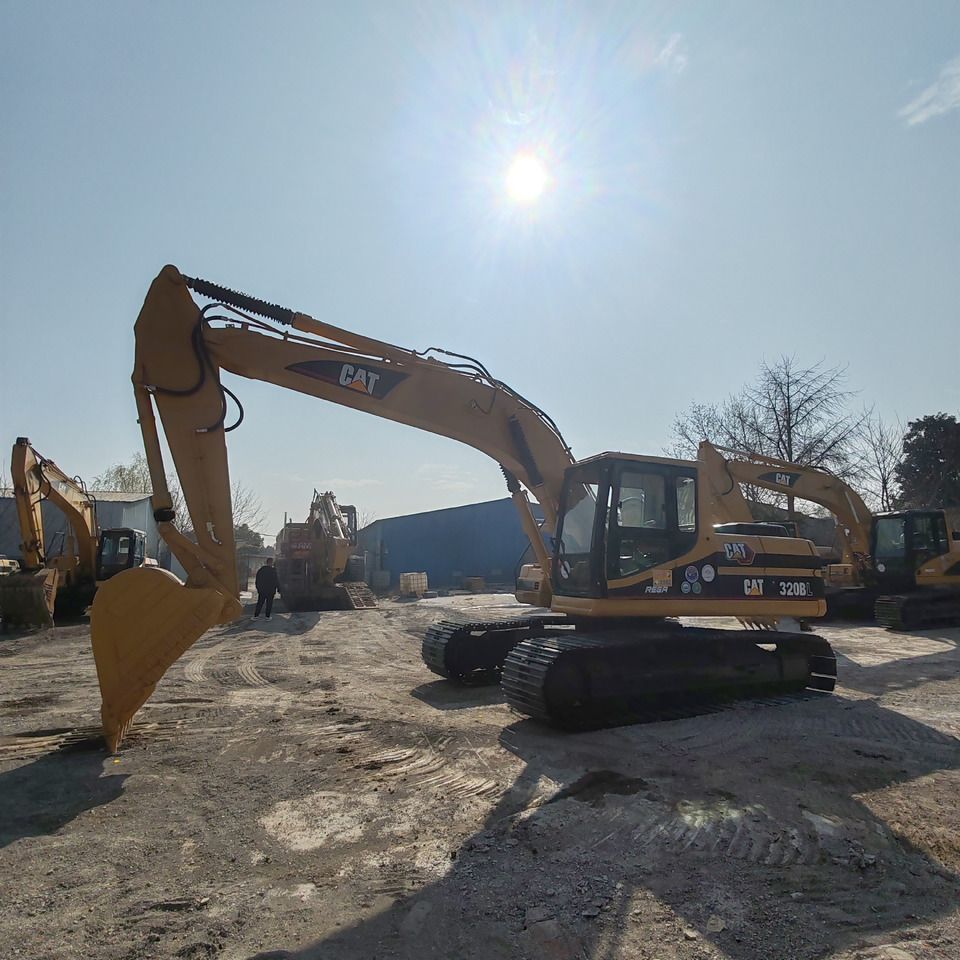 2018 Caterpillar 320BL crawler excavator, side profile view