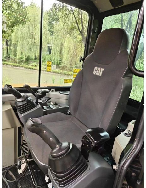 2022 Caterpillar 303.5ECR mini excavator interior cab view