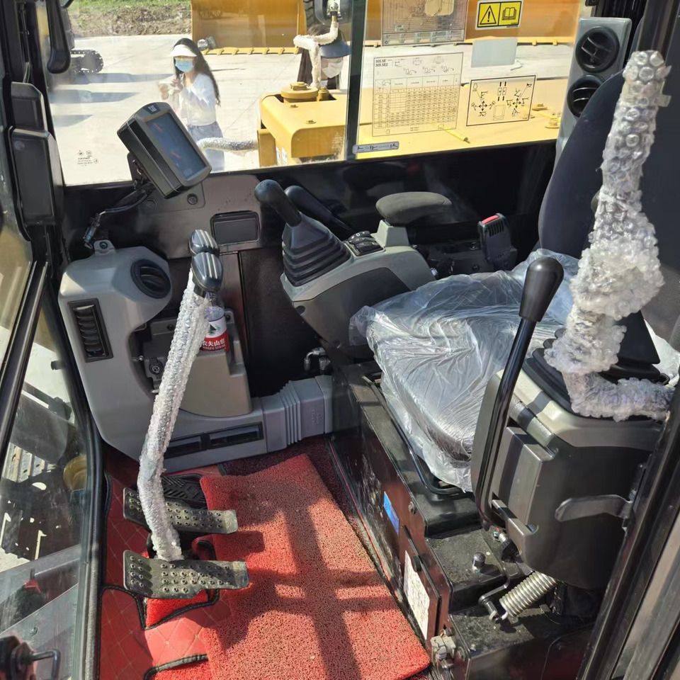 2022 Caterpillar 305.5E2 mini excavator interior view