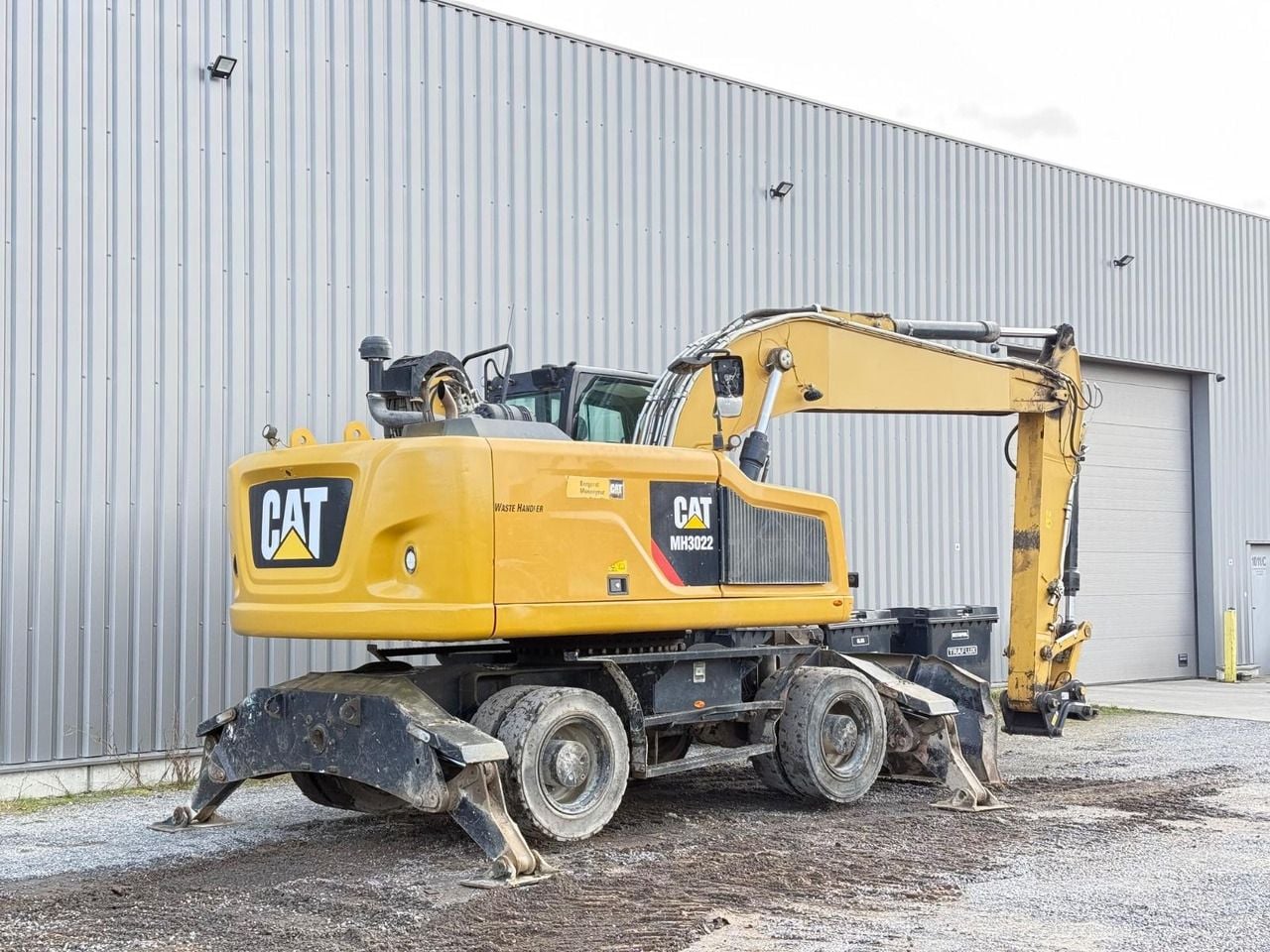 2018 Caterpillar MH3022 wheel excavator, rear three-quarter view 2018 Caterpillar MH3022 wheel excavator, rear three-quarter view