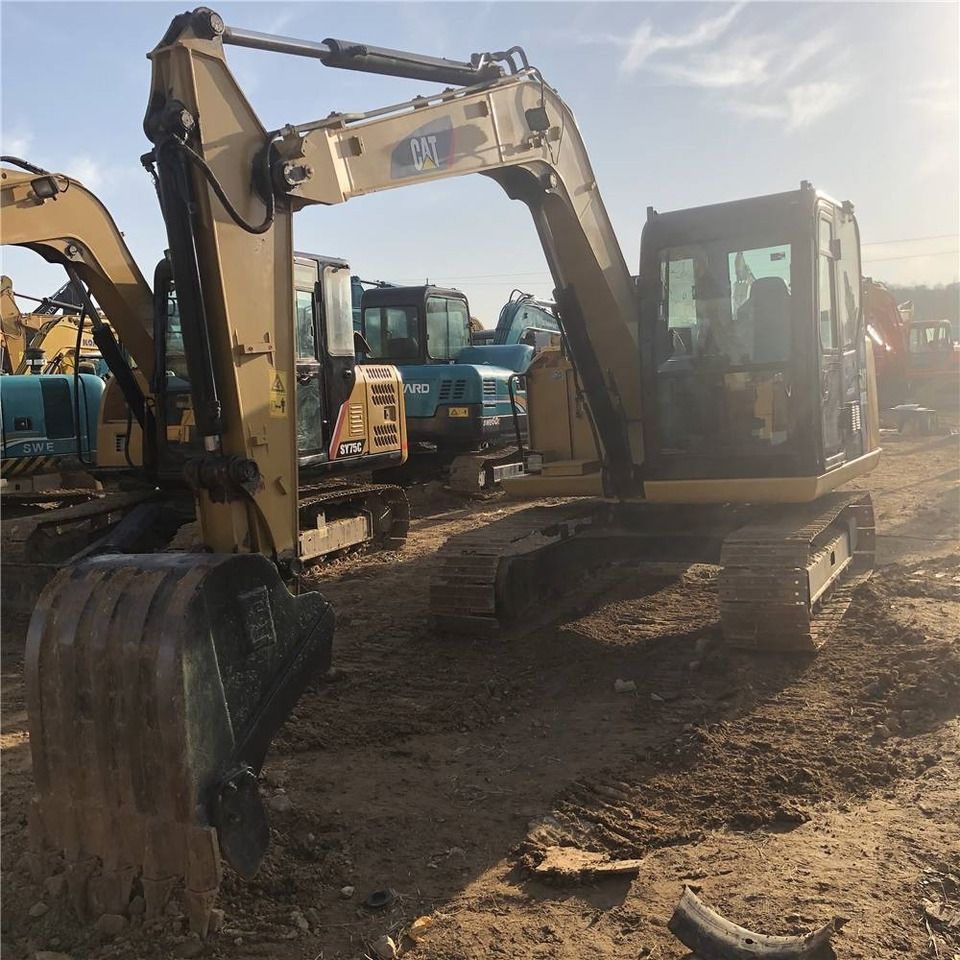 2023 Caterpillar 307E2 mini excavator, front three-quarter view