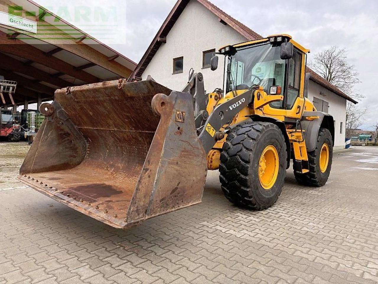 2013 Volvo L60G wheel loader, front three-quarter view 2013 Volvo L60G wheel loader, front three-quarter view