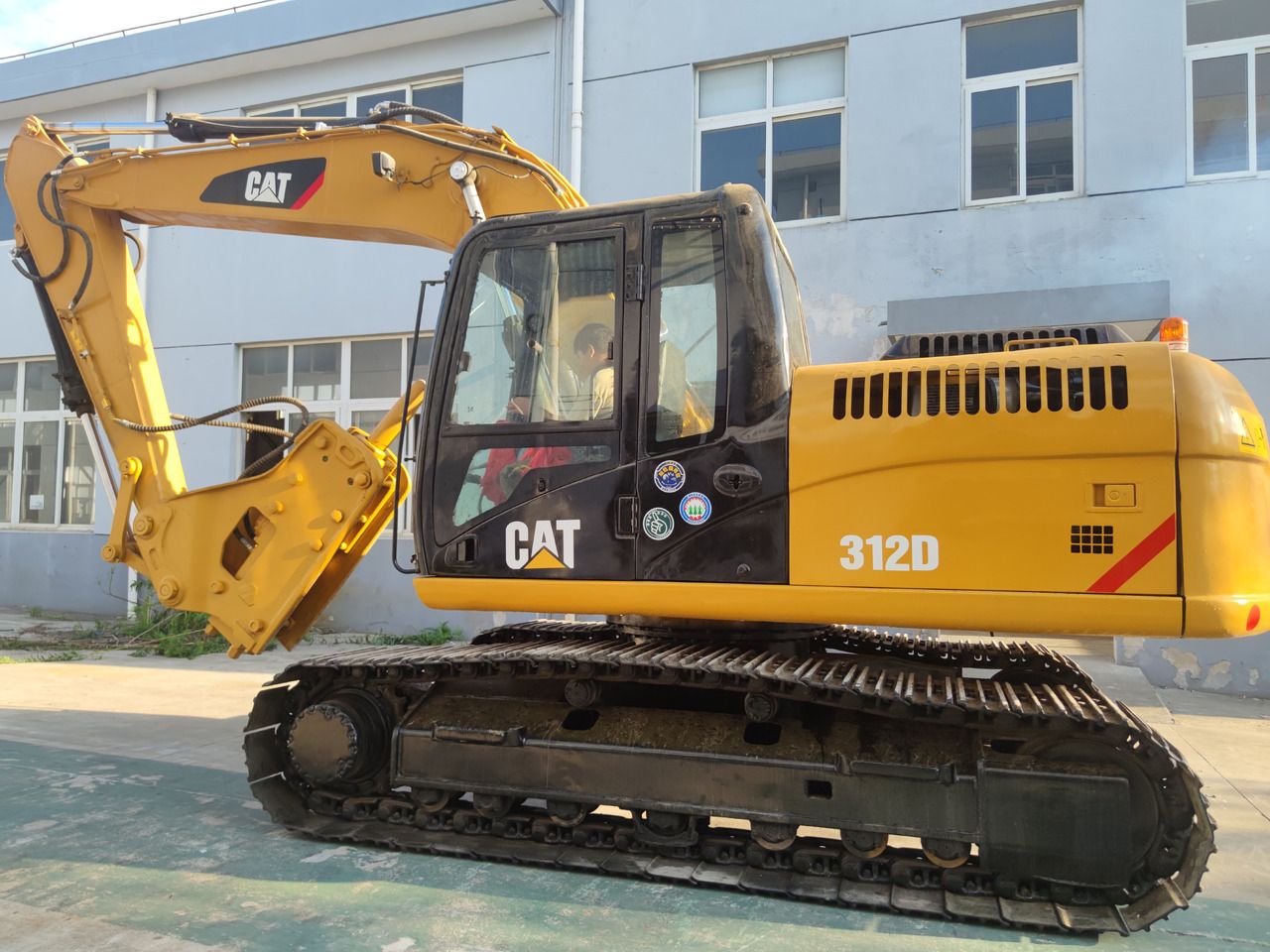 Caterpillar 312D crawler excavator, side view