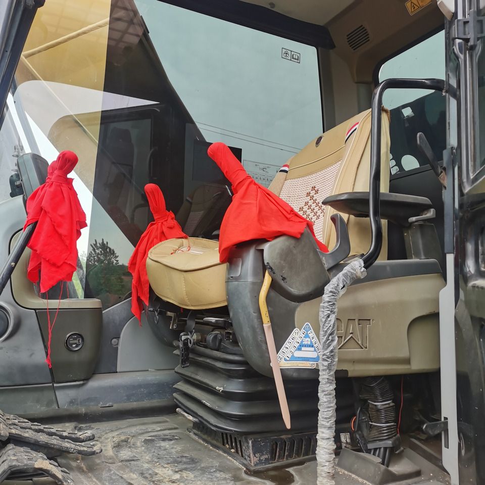 2020 Caterpillar 323DL excavator cab interior view