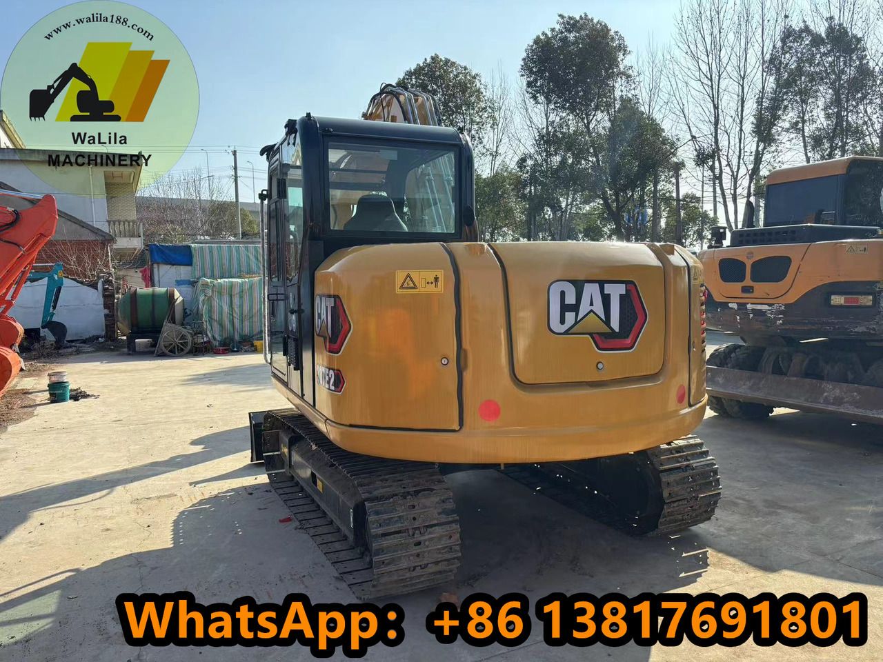 2022 Caterpillar 307E2 mini excavator rear three-quarter view