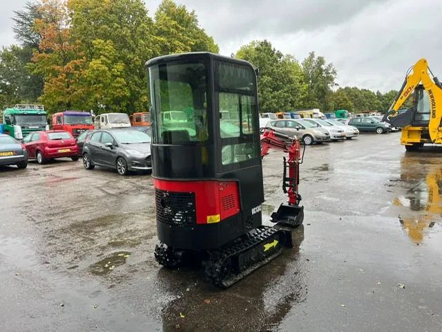 2025 Vicsec VC13C Mini Excavator with red boom and black body, showing the rear three-quarter view. 2025 Vicsec VC13C Mini Excavator with red boom and black body, showing the rear three-quarter view.