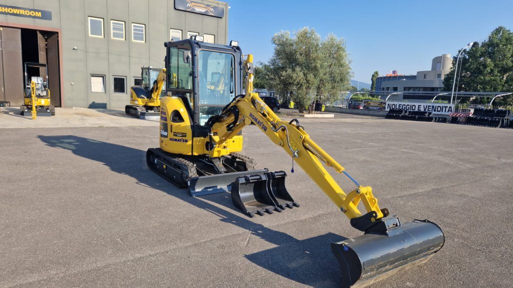 2023 Komatsu PC24MR-5 mini excavator, front three-quarter view