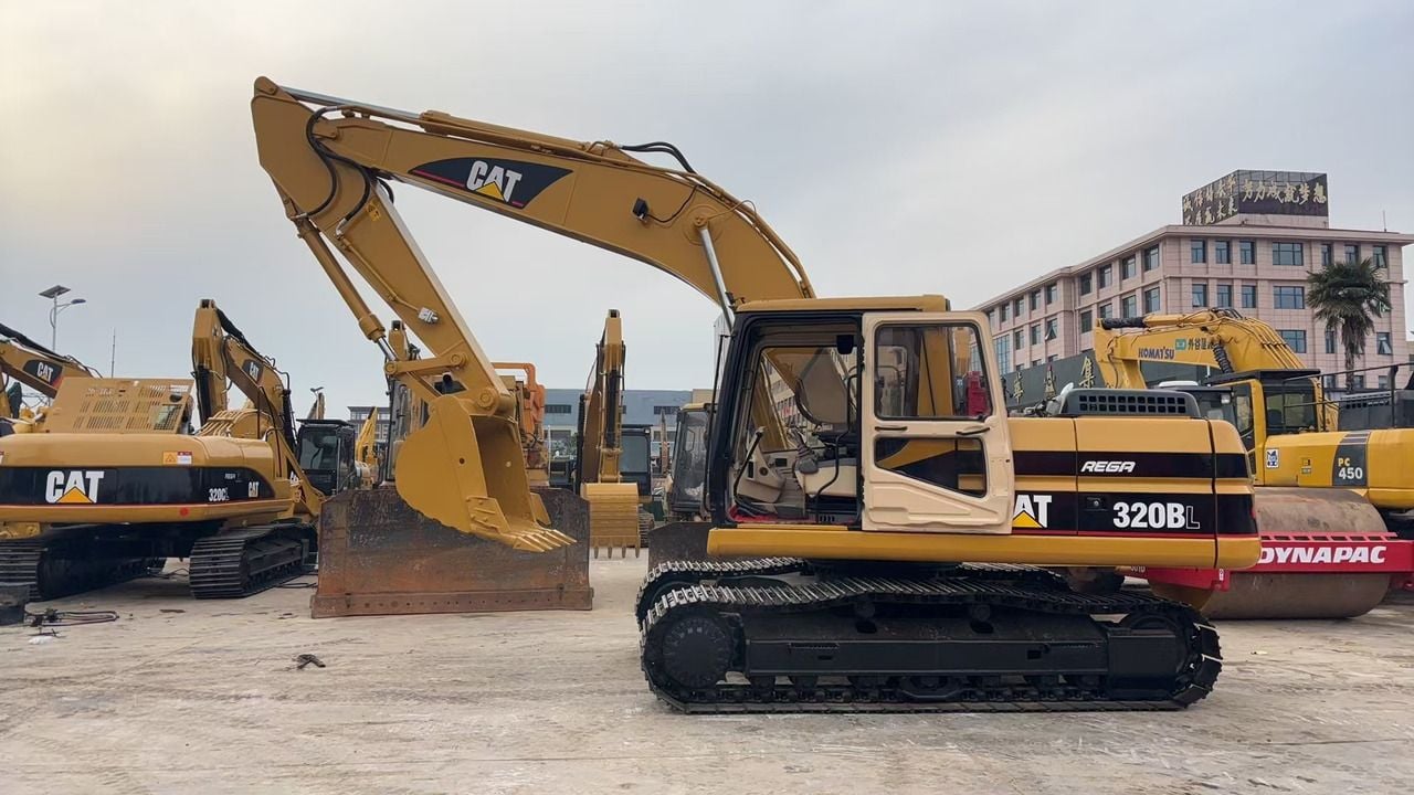 2023 Caterpillar 320BL crawler excavator, side profile view