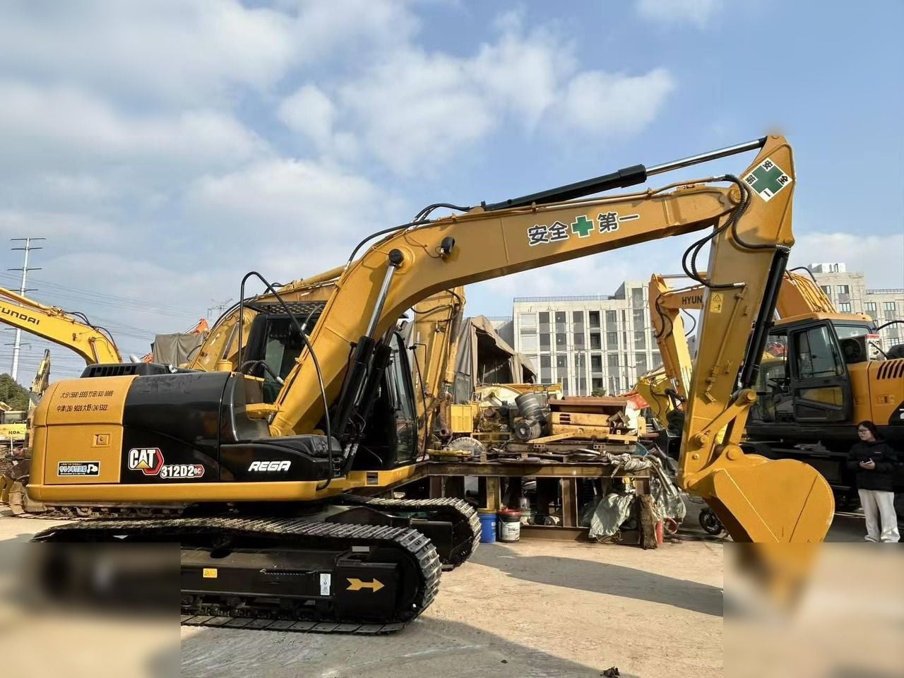 2022 Caterpillar 312D2 GC crawler excavator side view 2022 Caterpillar 312D2 GC crawler excavator side view