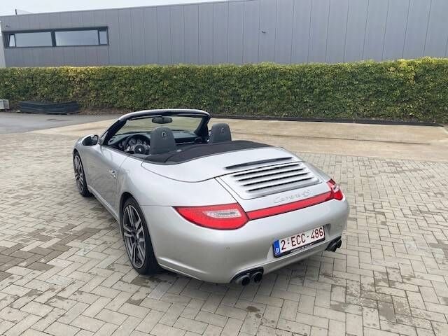 2009 Porsche 997.2 4S convertible rear three-quarter view