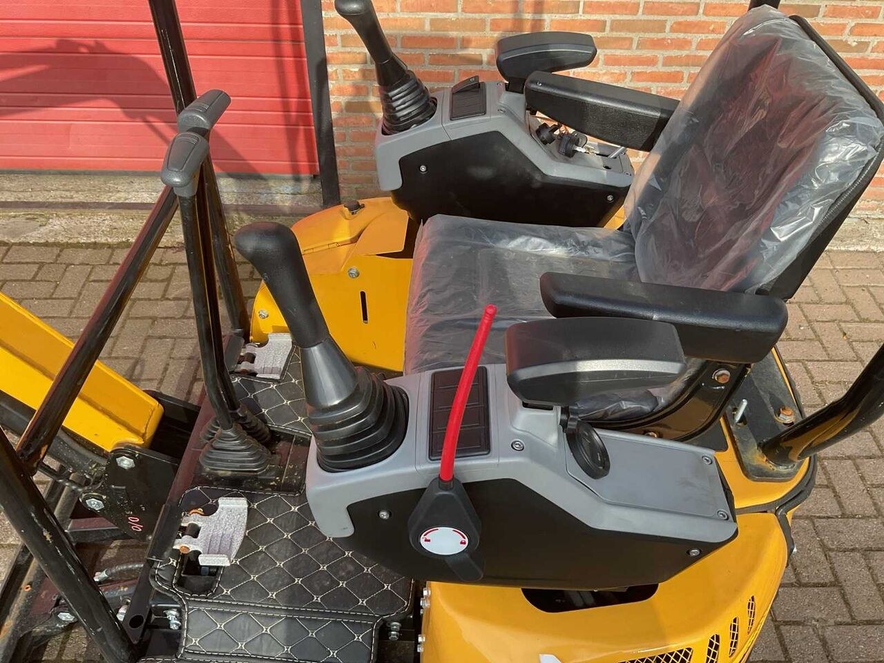 JPC KV15 mini excavator operator station view