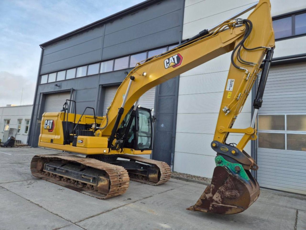 2023 Caterpillar 320GC crawler excavator, side view