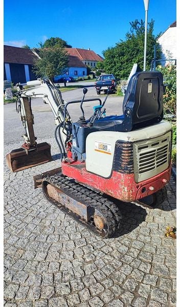 2009 Takeuchi TB108 mini excavator, rear three-quarter view