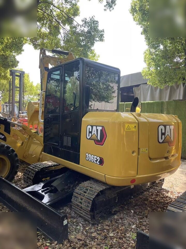 2024 Caterpillar 306E2 crawler excavator, rear three-quarter view