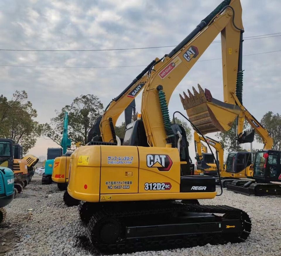 Caterpillar 312D2 GC crawler excavator, rear three-quarter view