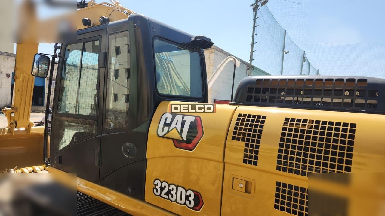 2026 Caterpillar 323D3 crawler excavator cab and engine cover view 2026 Caterpillar 323D3 crawler excavator cab and engine cover view