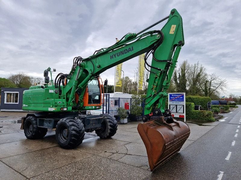 2015 Hyundai R160W-9A wheel excavator, side profile view