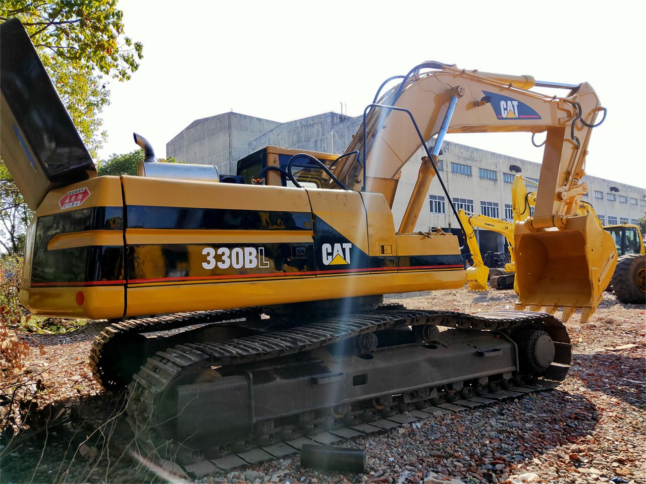 2022 Caterpillar 330BL crawler excavator, rear three-quarter view