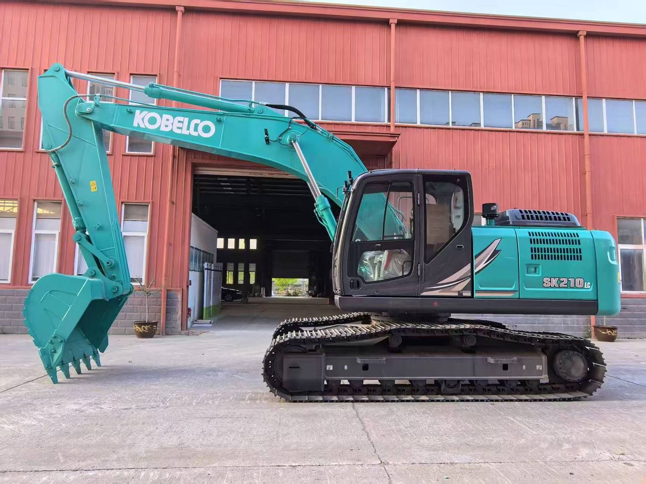 2025 Kobelco SK210LC excavator side view