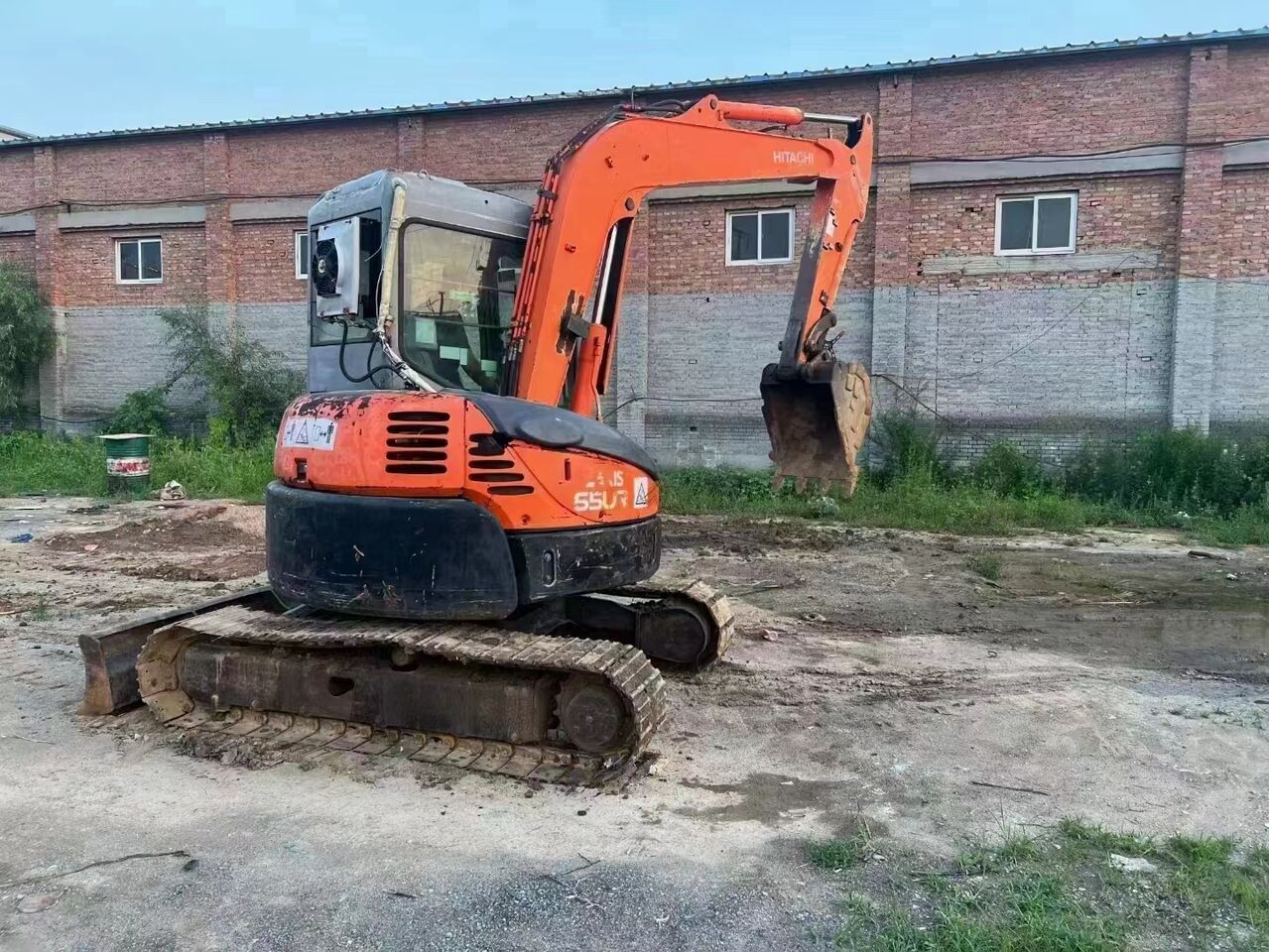 2023 Hitachi ZX55UR excavator, rear three-quarter view 2023 Hitachi ZX55UR excavator, rear three-quarter view