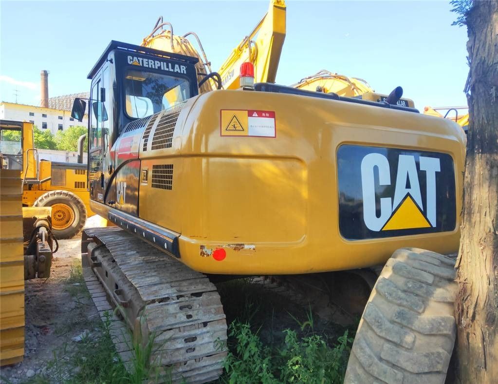 2023 Caterpillar 325C crawler excavator rear three-quarter view