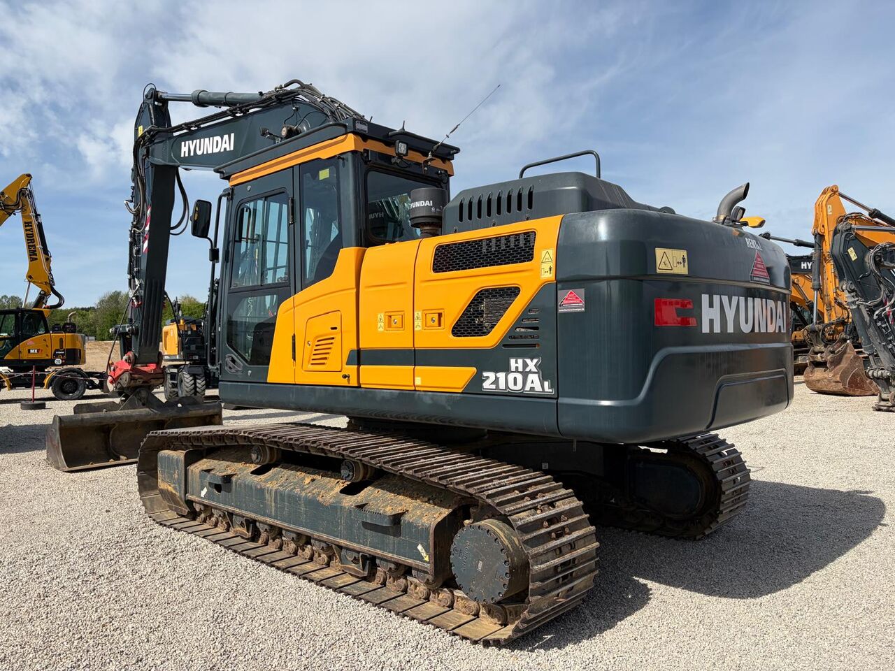 2022 Hyundai HX210AL crawler excavator, rear three-quarter view