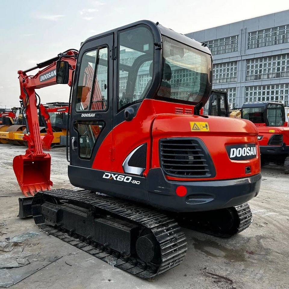 2024 Doosan DX60-9C mini excavator, front three-quarter view