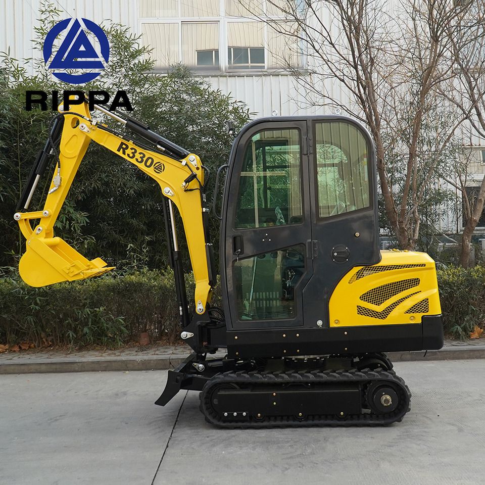 2026 Rippa R330 Mini Excavator from the side, highlighting the black rubber tracks and the yellow main body.