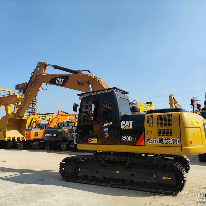2023 Caterpillar 320D2 L crawler excavator, rear three-quarter view