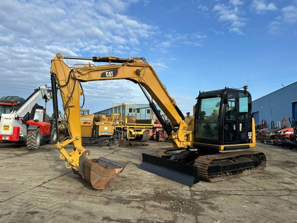 2015 Caterpillar 308E2CR mini excavator, side view
