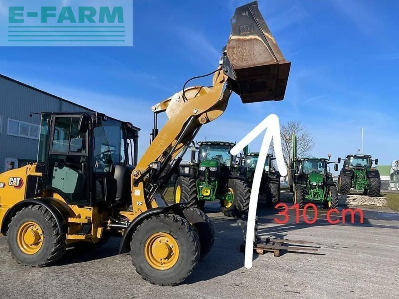 2021 Caterpillar 907M wheel loader side view 2021 Caterpillar 907M wheel loader side view