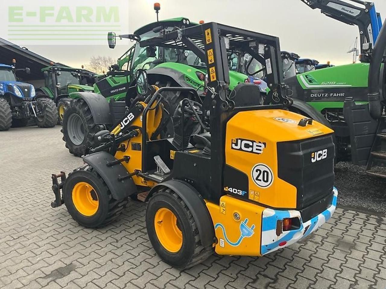 2023 JCB 403 E AGRI mini excavator, rear three-quarter view 2023 JCB 403 E AGRI mini excavator, rear three-quarter view