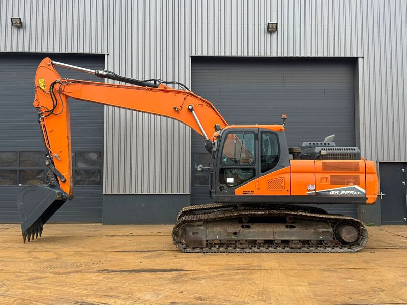 2022 Doosan DX225LC-7 crawler excavator, side profile view