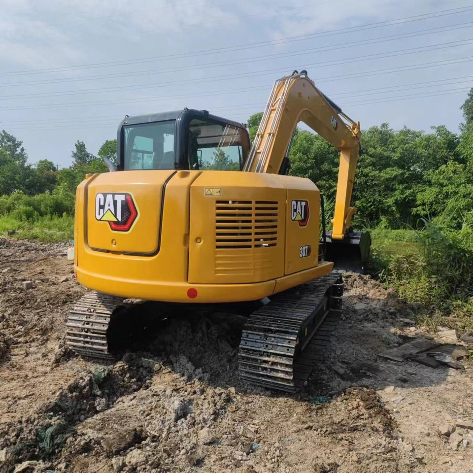 2020 Caterpillar 307E mini excavator, rear three-quarter view