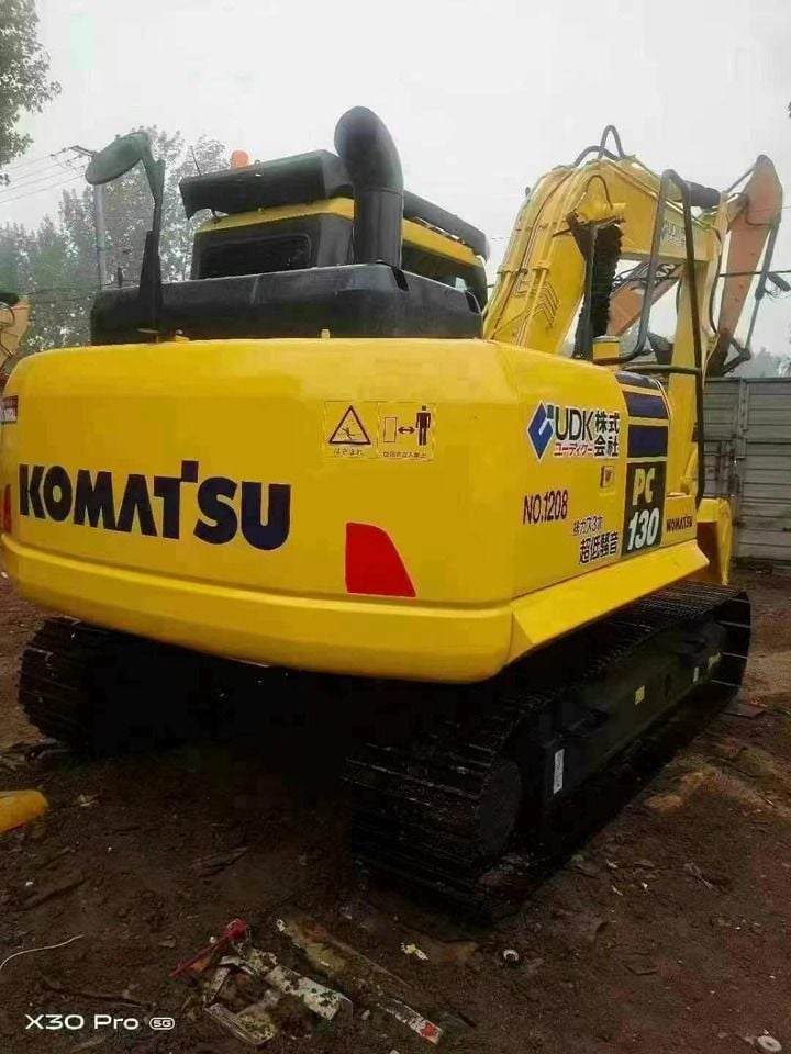 2022 Komatsu PC130-7 crawler excavator, rear three-quarter view