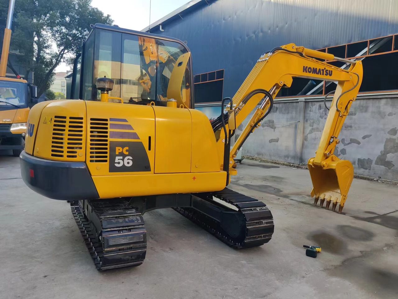 2022 Komatsu PC56 crawler excavator, rear three-quarter view