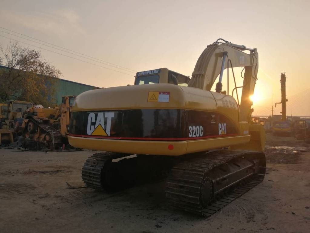 2021 Caterpillar 320C crawler excavator, rear three-quarter view