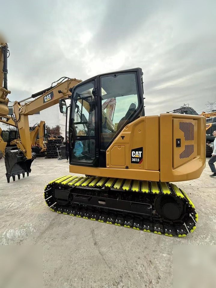 2025 Caterpillar 307.5 crawler excavator, side profile view