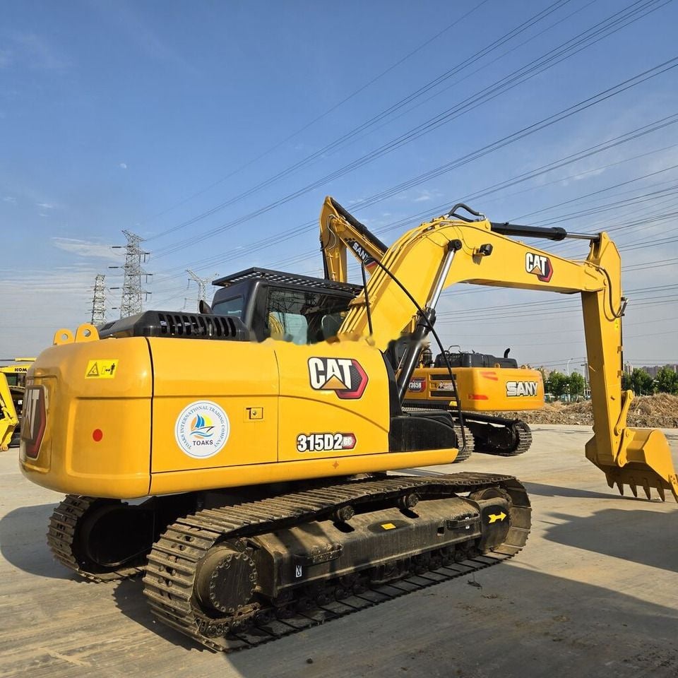 2021 Caterpillar 315D2 crawler excavator, rear three-quarter view