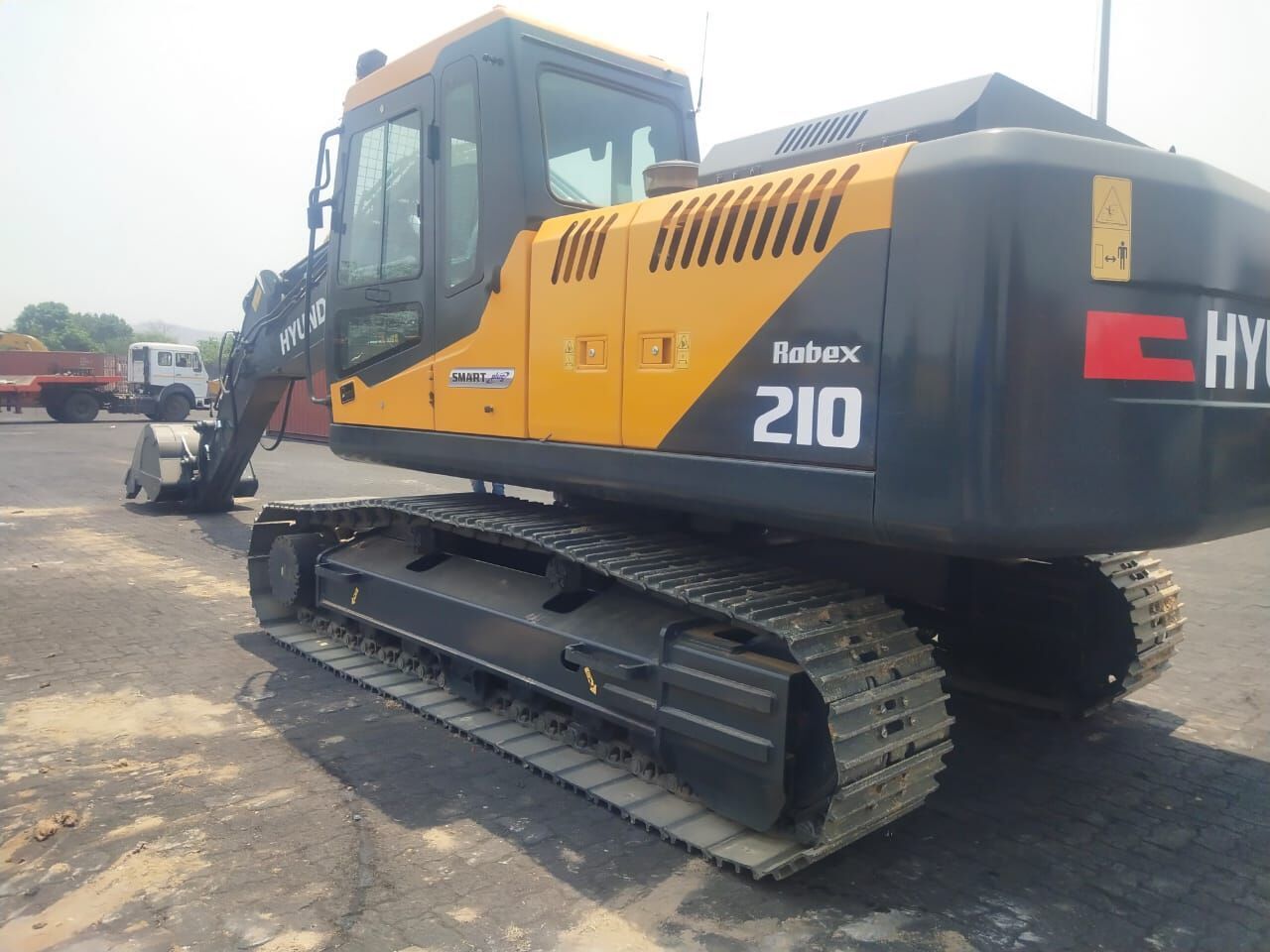 2025 Hyundai Robex 210 crawler excavator, rear three-quarter view 2025 Hyundai Robex 210 crawler excavator, rear three-quarter view