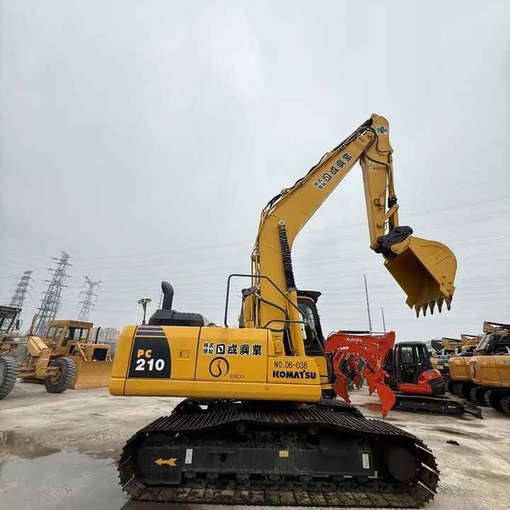 2011 Komatsu PC210-8 crawler excavator side view