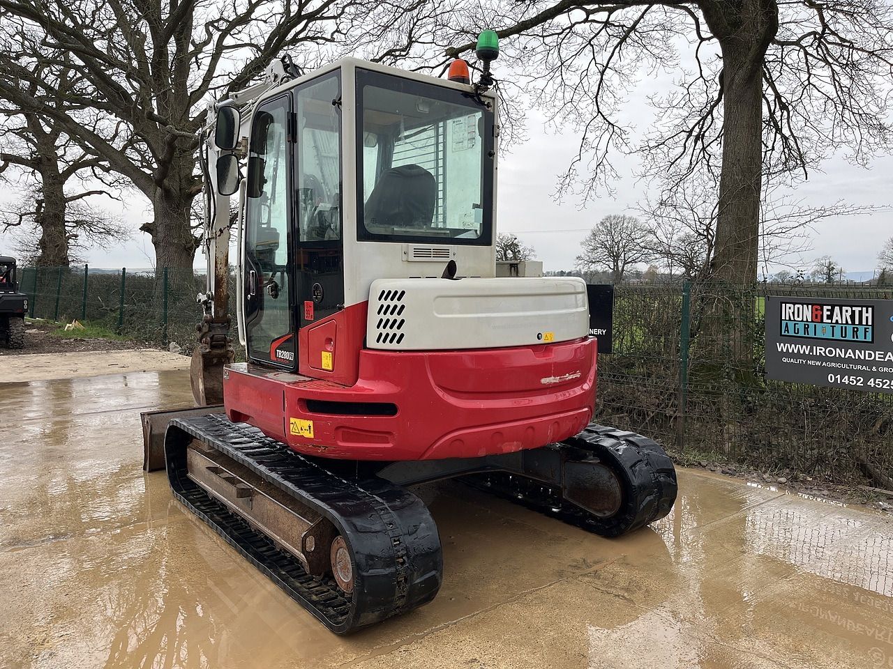 2018 Takeuchi TB280FR mini excavator, rear three-quarter view