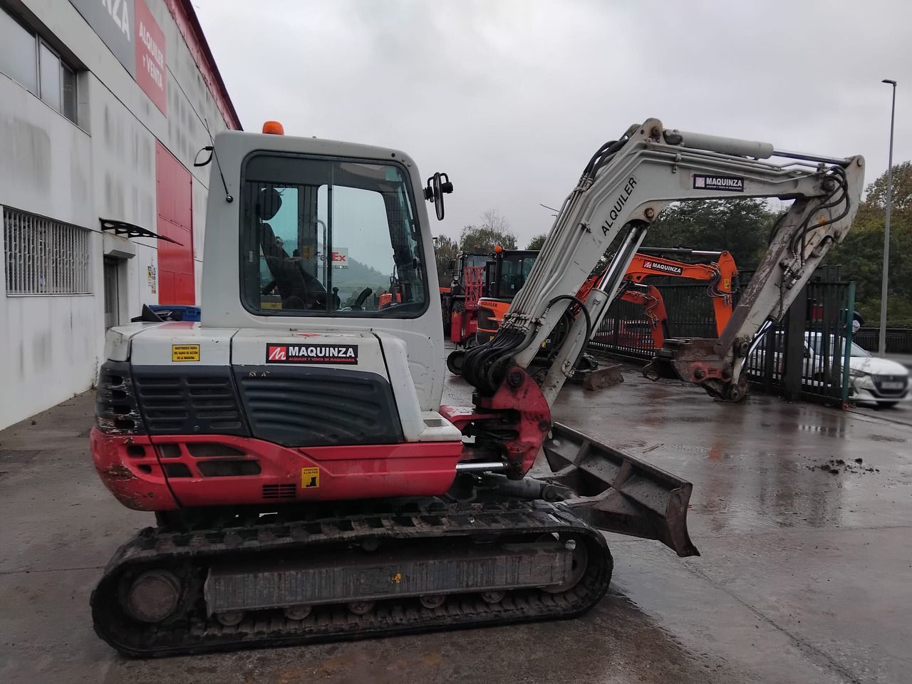 2016 Takeuchi TB250 mini excavator side view