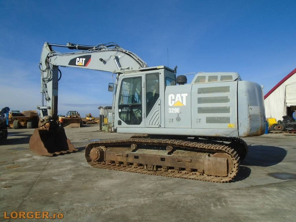 2014 Caterpillar 329EL crawler excavator, side profile view