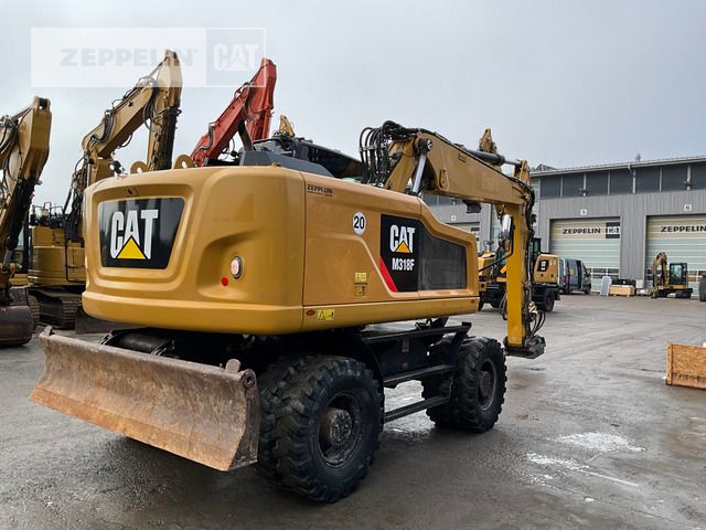 2015 Caterpillar M318F wheel excavator, rear three-quarter view