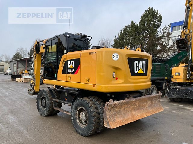 2015 Caterpillar M318F wheel excavator rear three-quarter view
