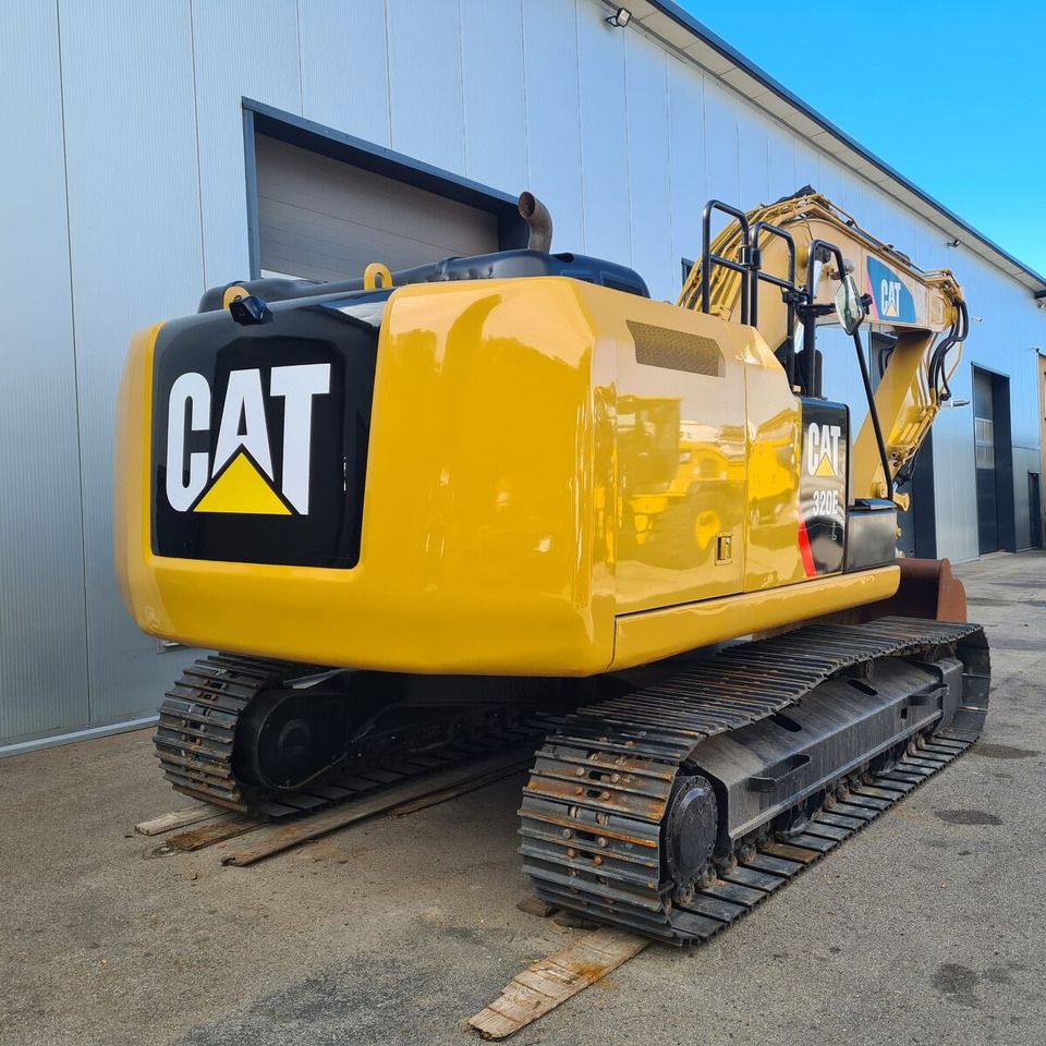 2016 Caterpillar 320E crawler excavator, rear three-quarter view